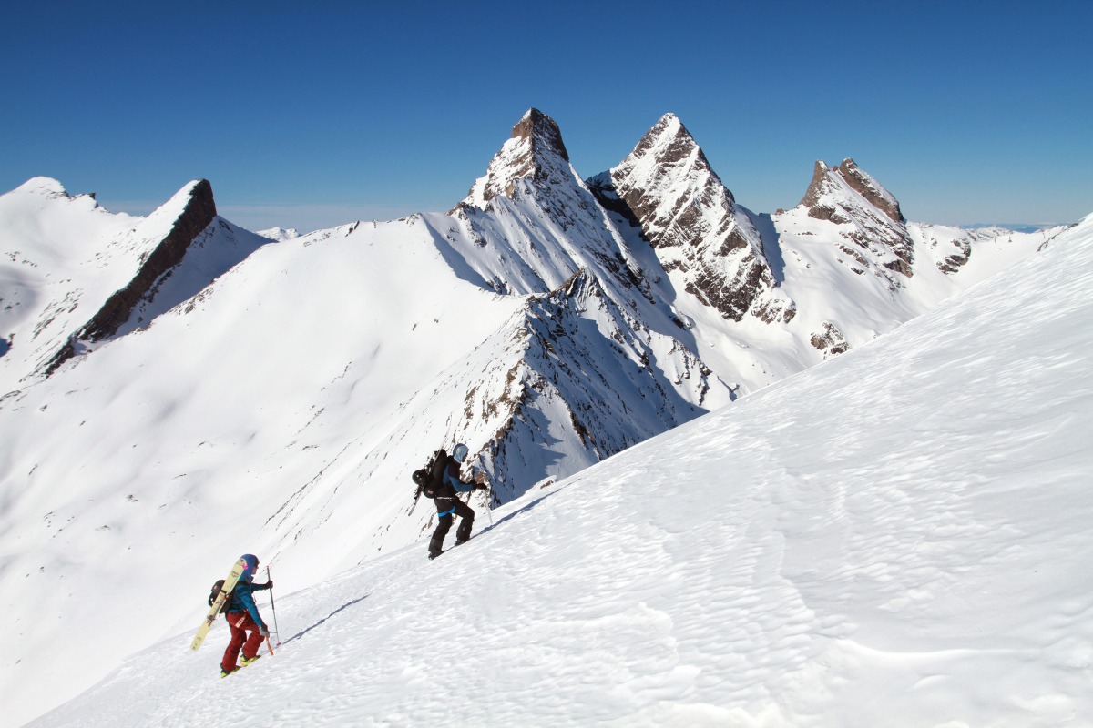 Clients on the first-ever Mystery Trip never thought they'd find themselves here. Nearing the summit of Aiguille d'Argentiere (3,237m) in the French Alps for a descent of the rarely skied SW Couloir.