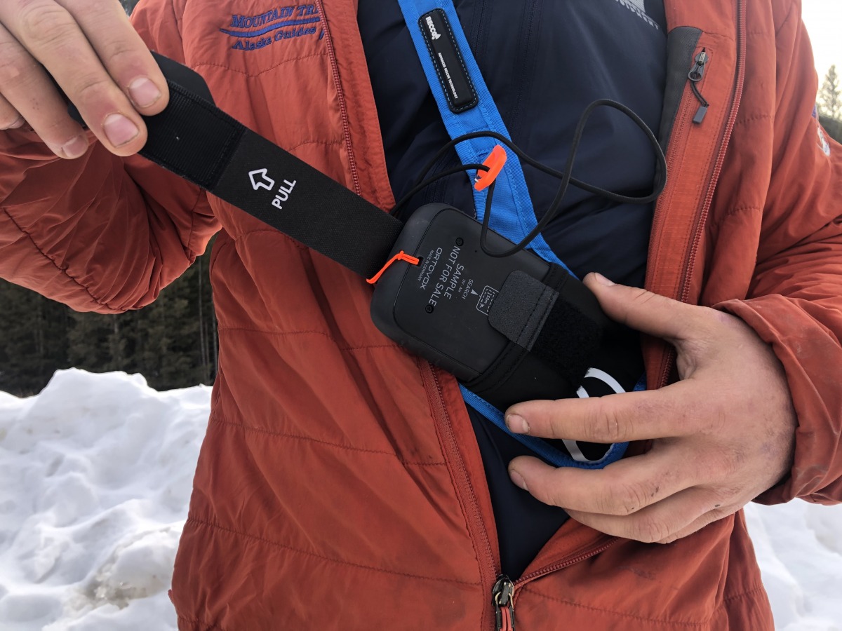 Harness strap is large and easy to pull which helps to remove the transceiver from the pocket