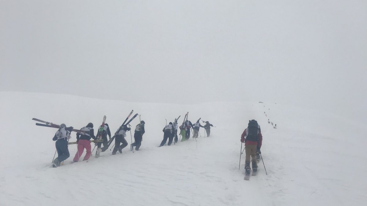 Skiers head uphill at the start of the Afghan Ski Challenge.