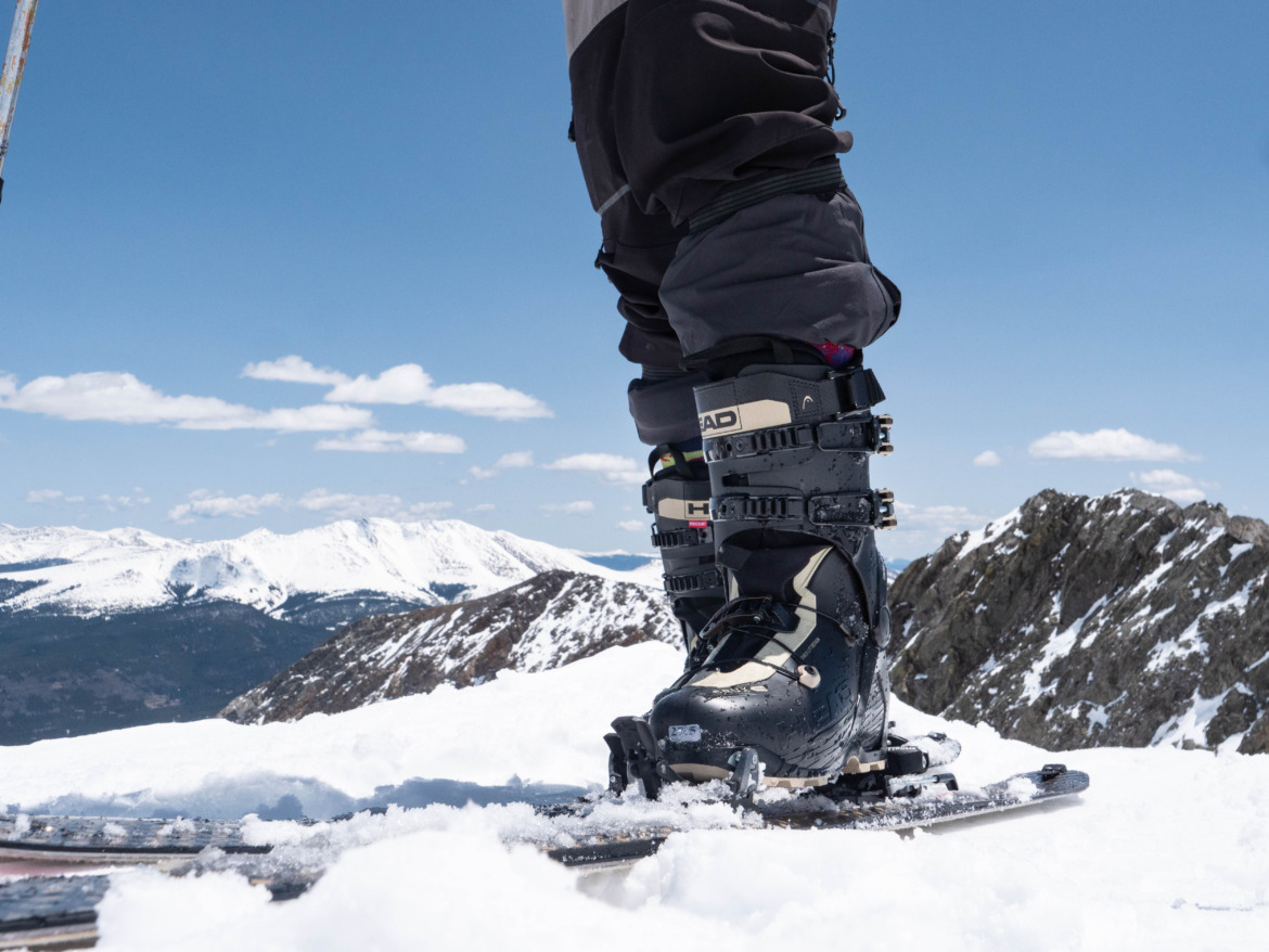 frontal view of skier in Head Crux Pro backcountry ski boots with mountains in the background