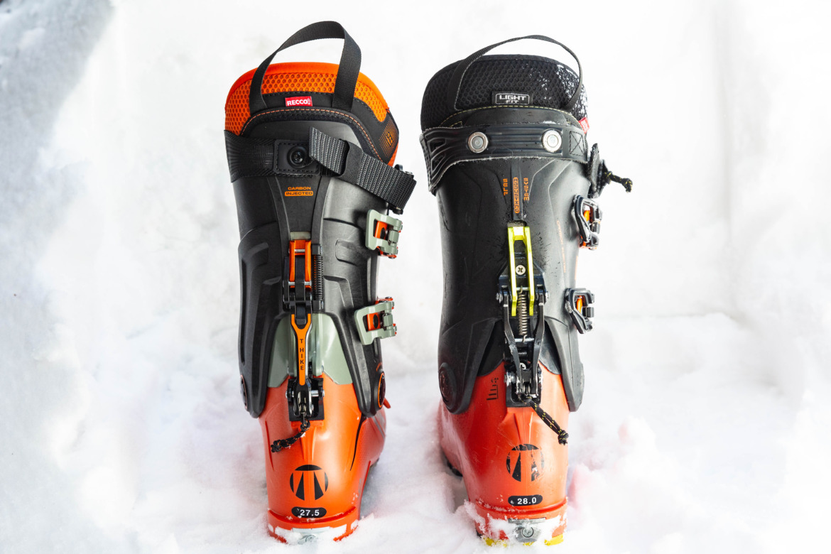 two versions of the Tecnica Zero G Tour Pro backcountry ski boots side by side from the rear showing the walk mode locking mechanism differences