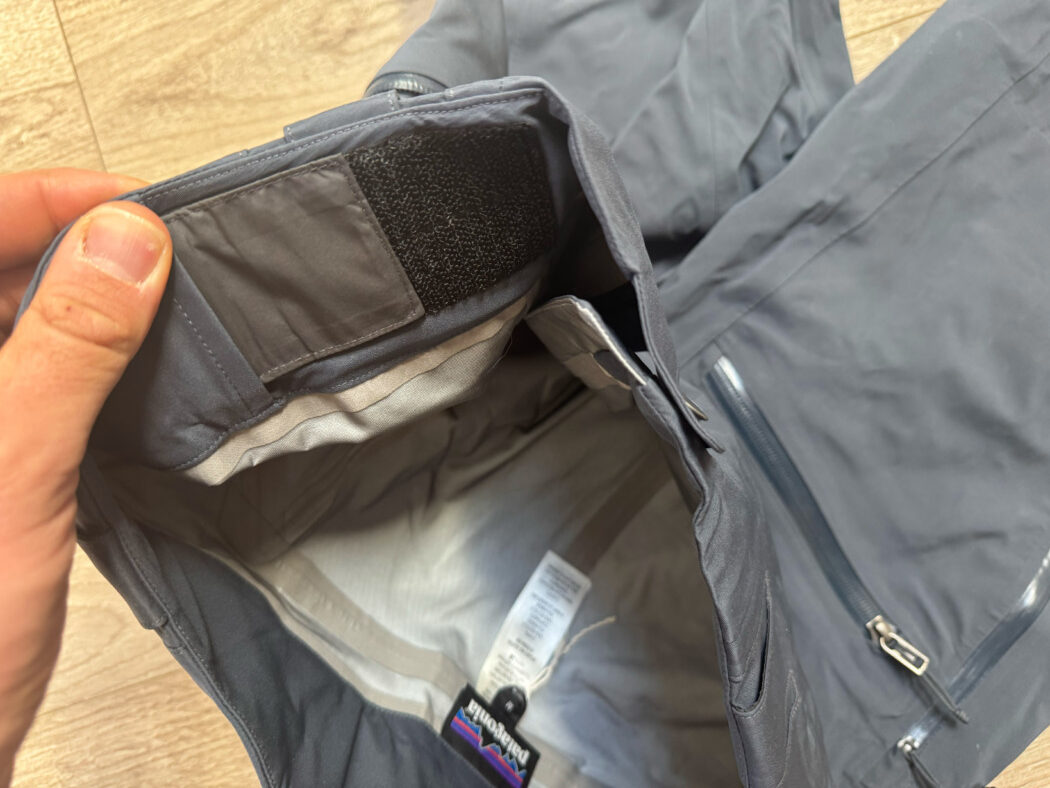 close up of Patagonia Stormstride Pants internal velcro waist tightening mechanism