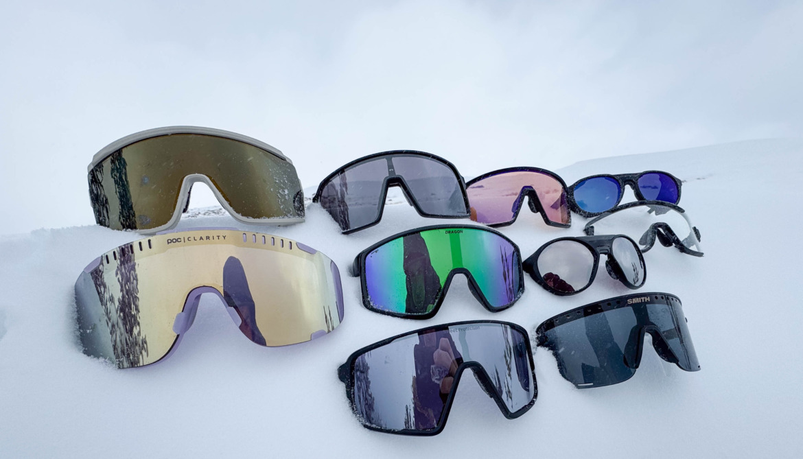 ski touring sunglasses arrayed in the snow 