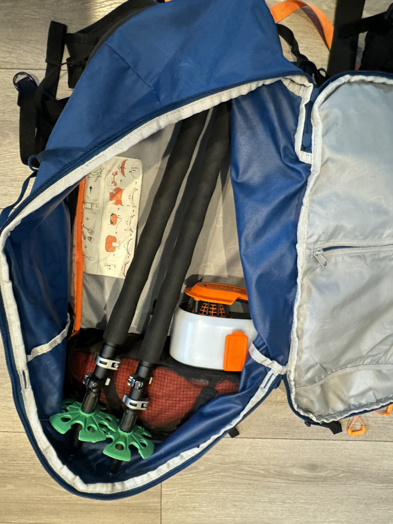 splitboarding poles inside ski pack