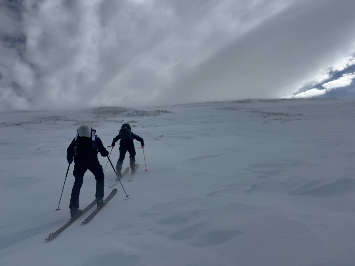 Skiers skinning up to Polar Star